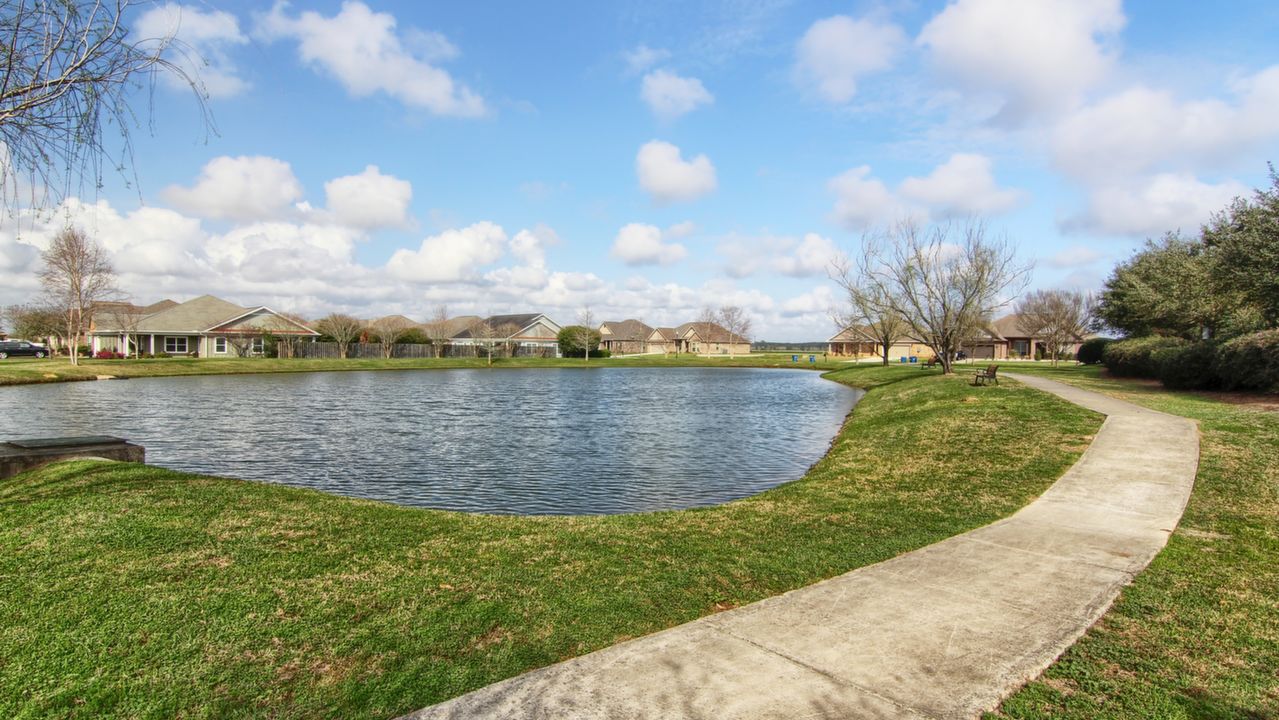 Pond with Paved Trail Near Entrance