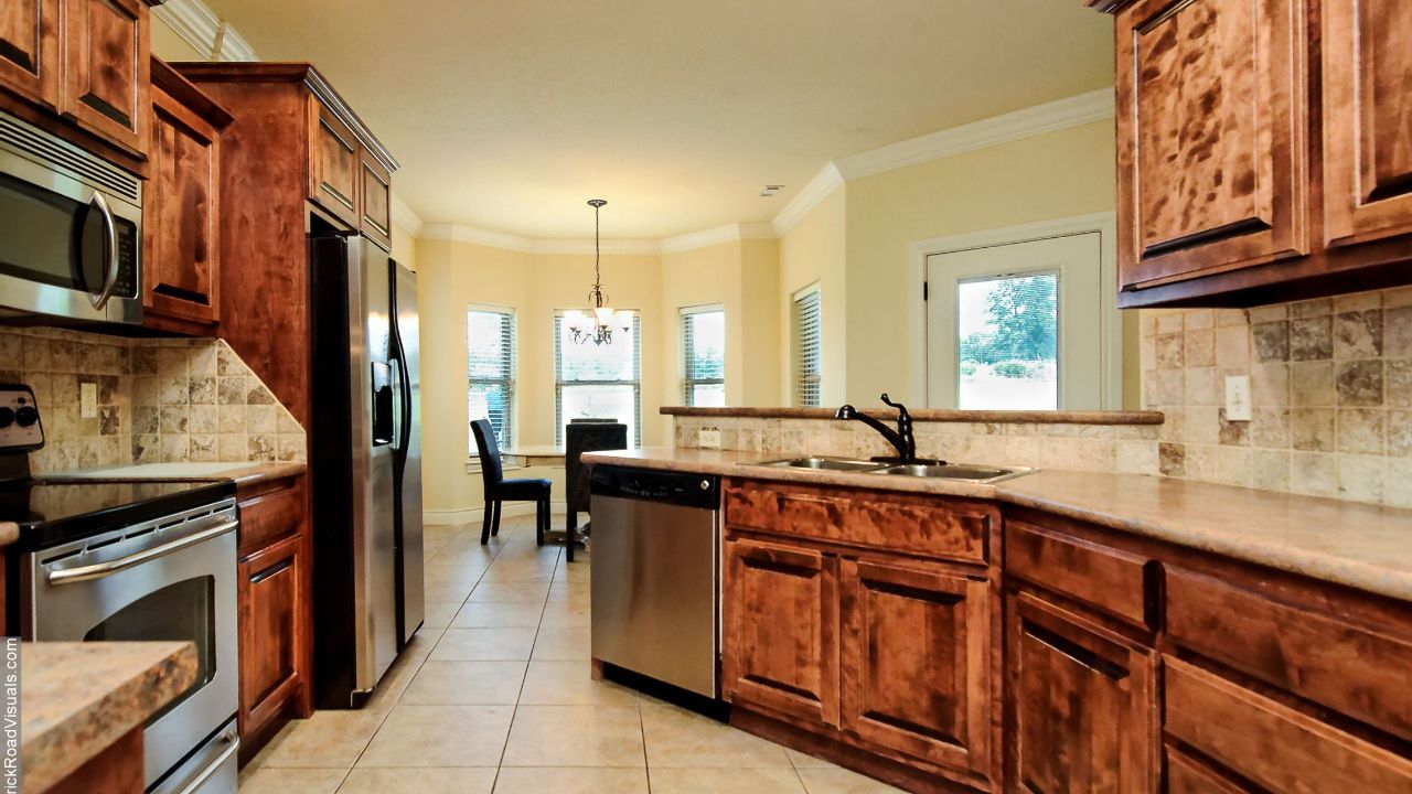 Kitchen opens up to breakfast nook.