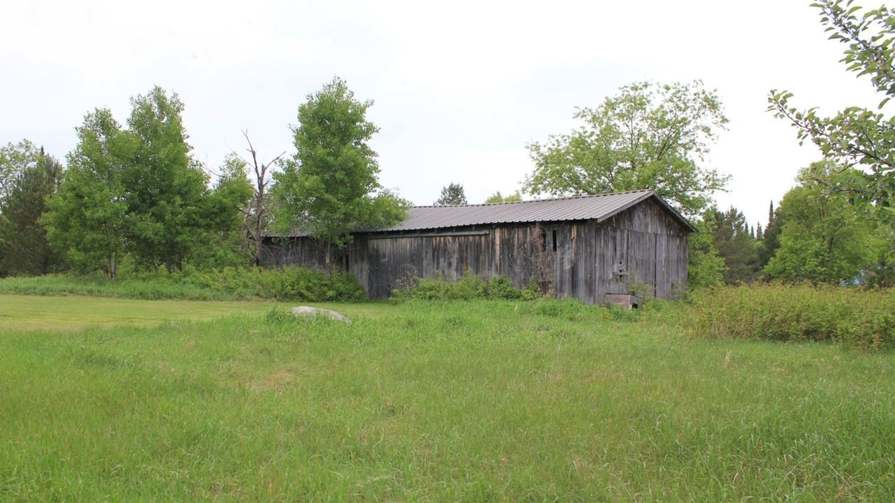 VIEW OF FIELDS & BARN