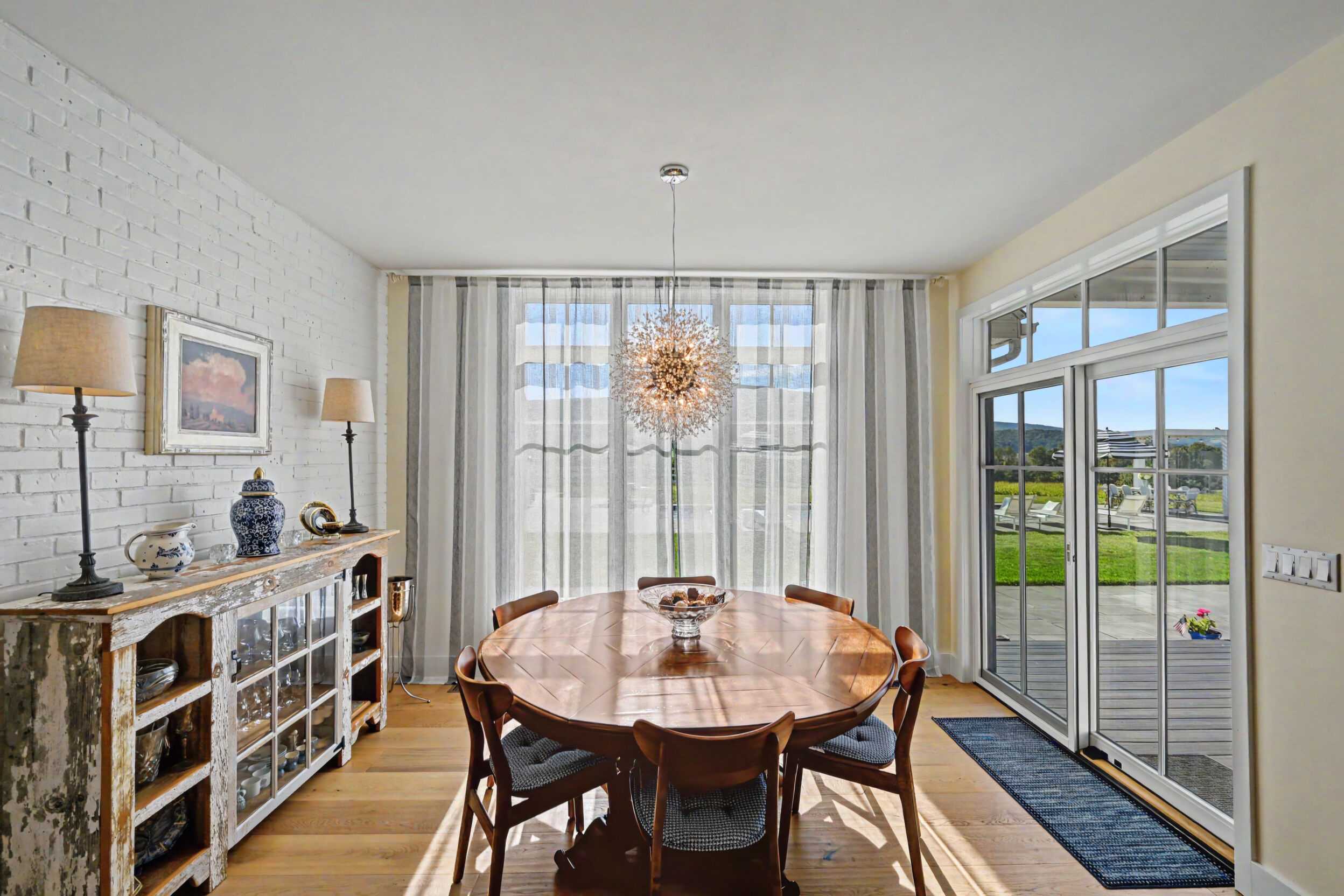 Dining area with oversized mountain-view window