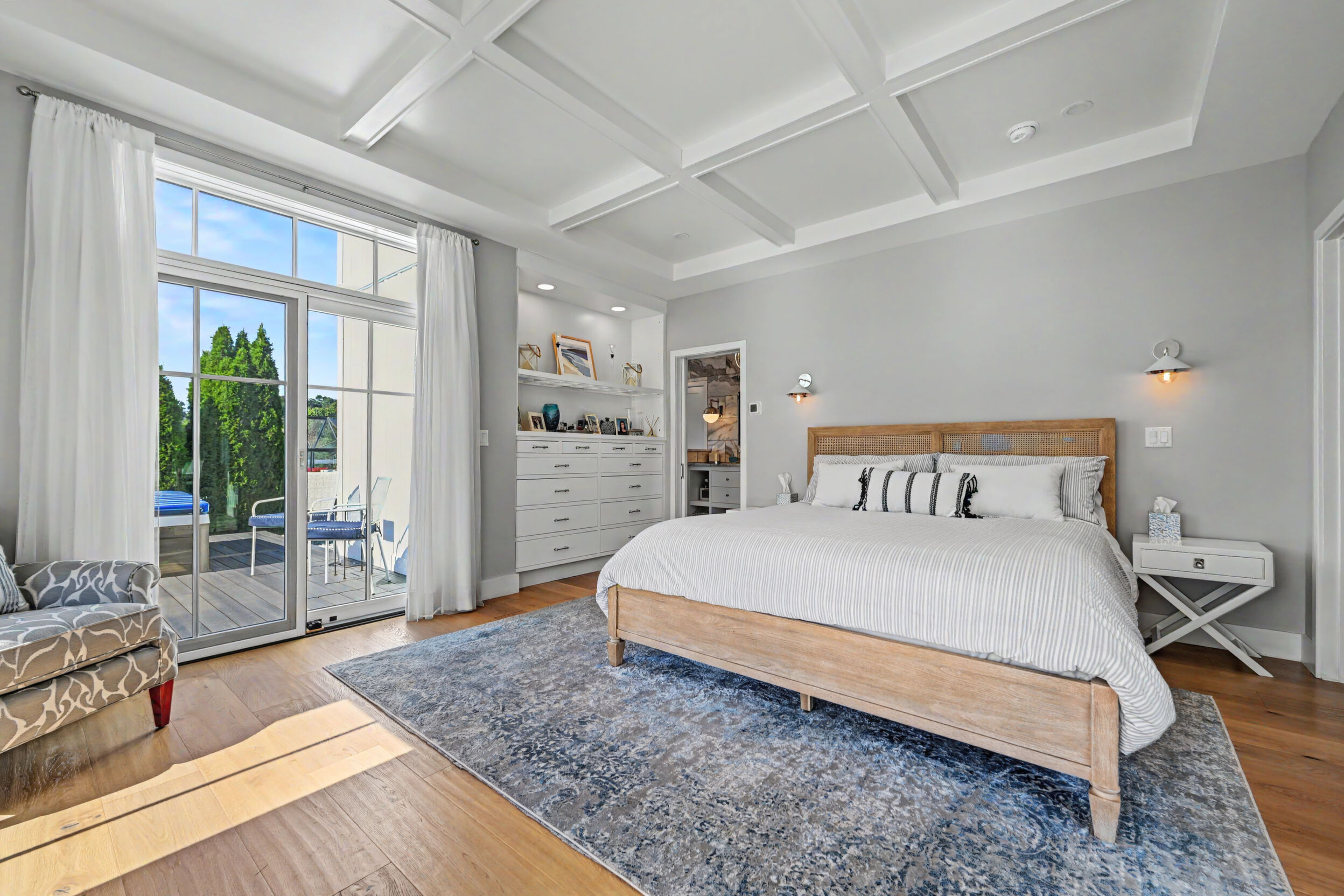 First-floor primary bedroom with coffered ceiling
