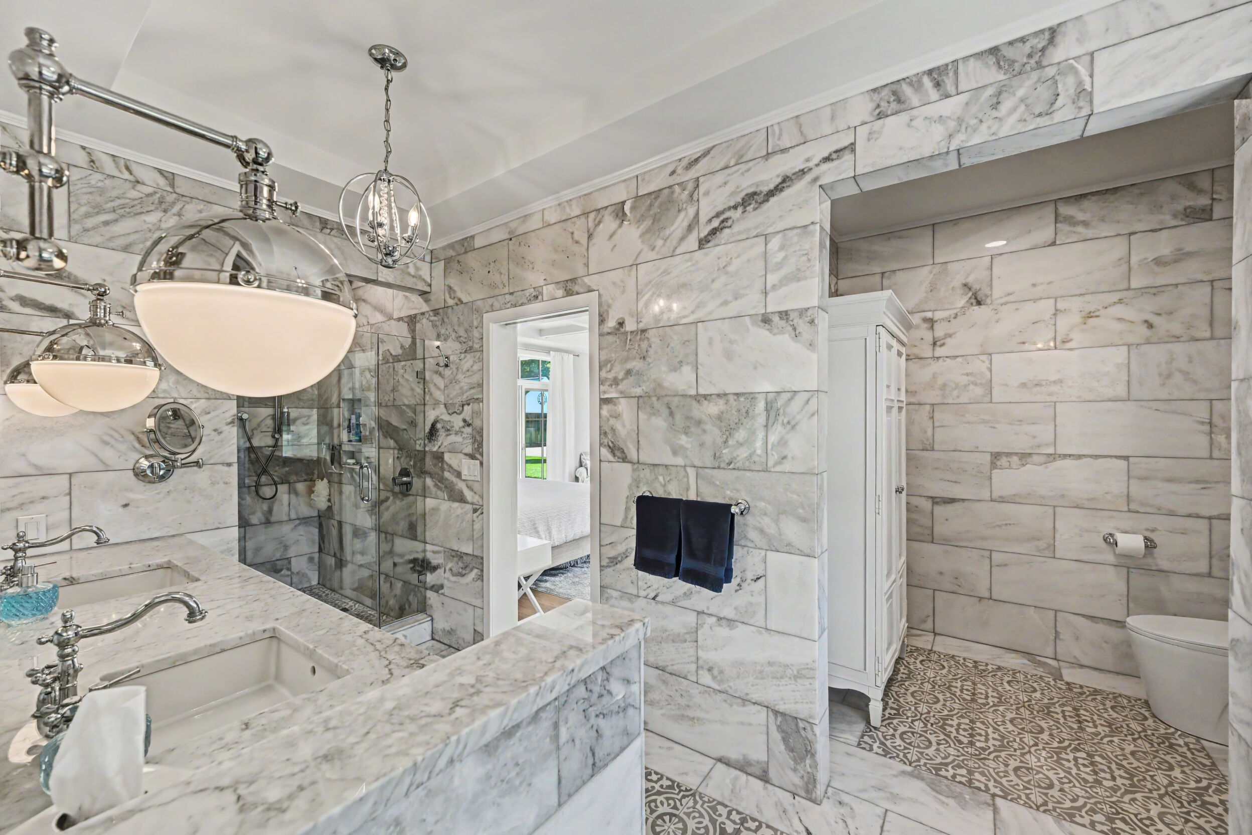 Marble walk-in shower with rain head