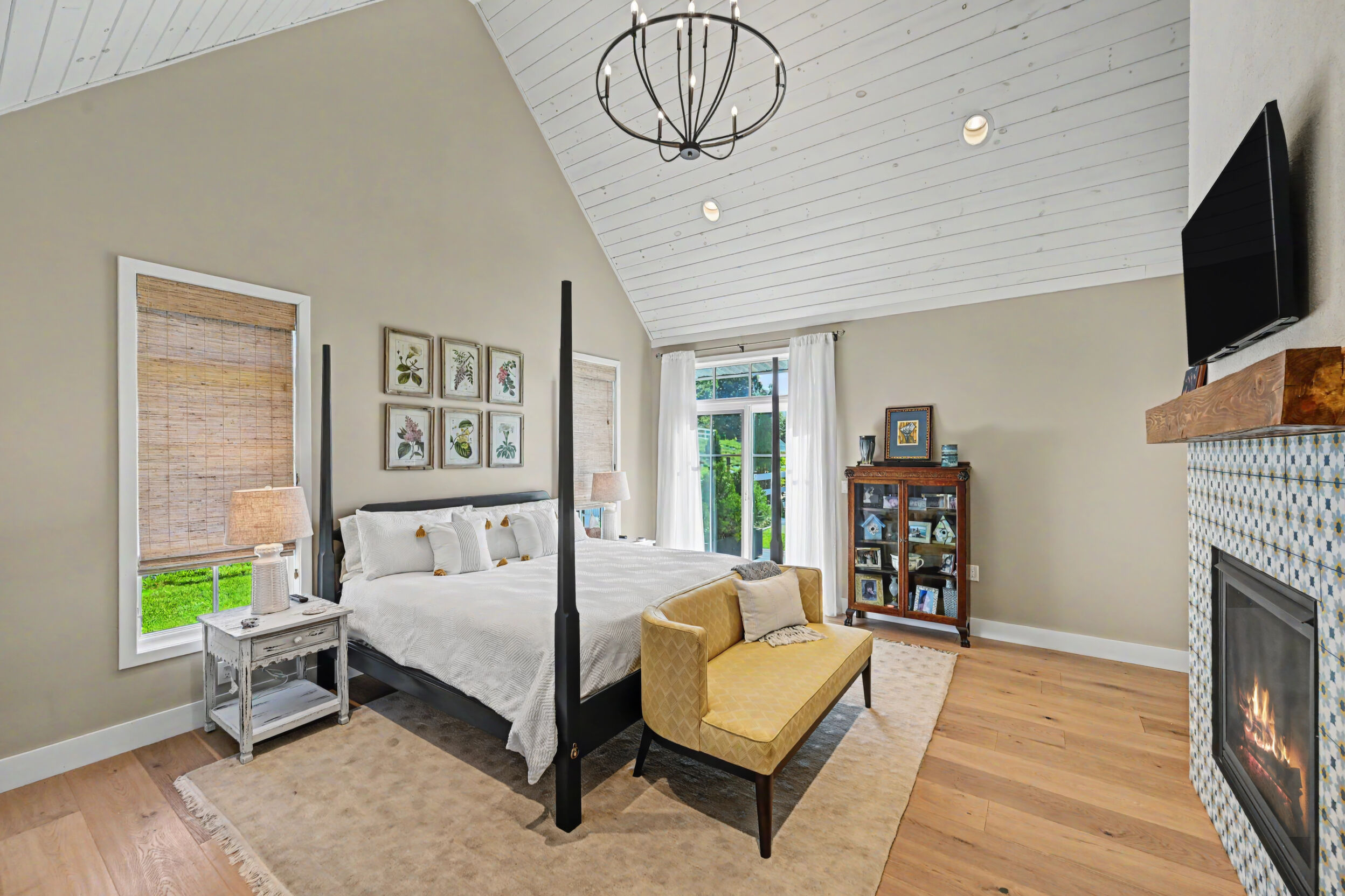 Main-level guest suite with vaulted gable ceiling
