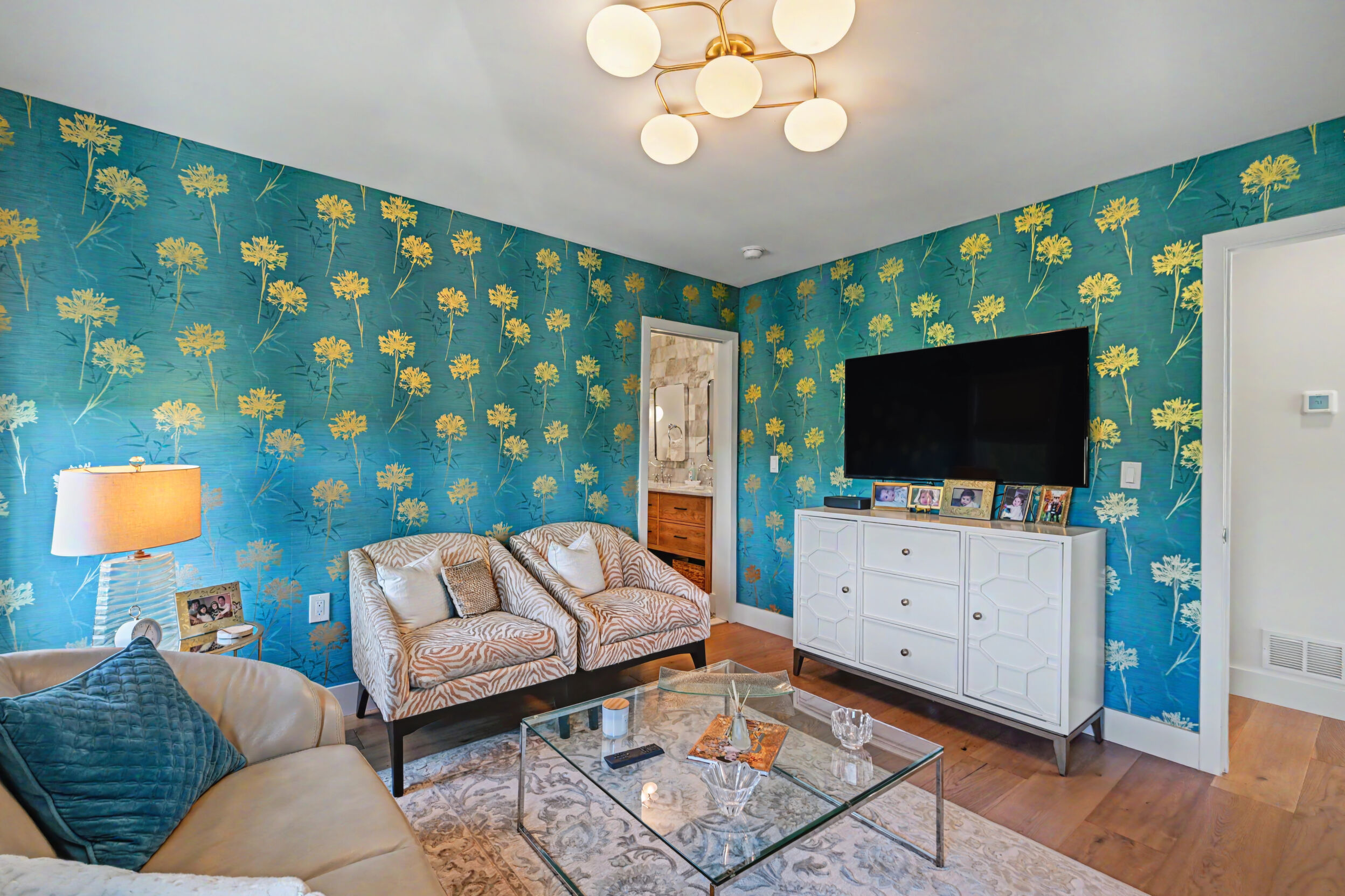 Upstairs bedroom with wallpapered study