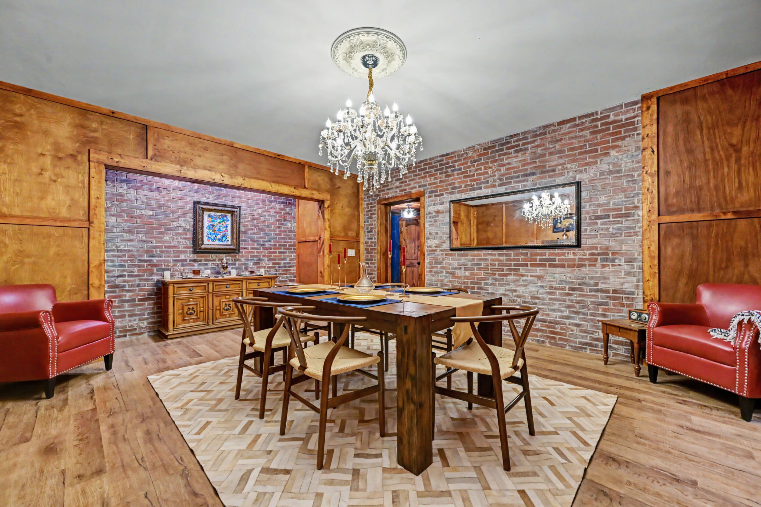 Wine cellar with brickwork and chandelier