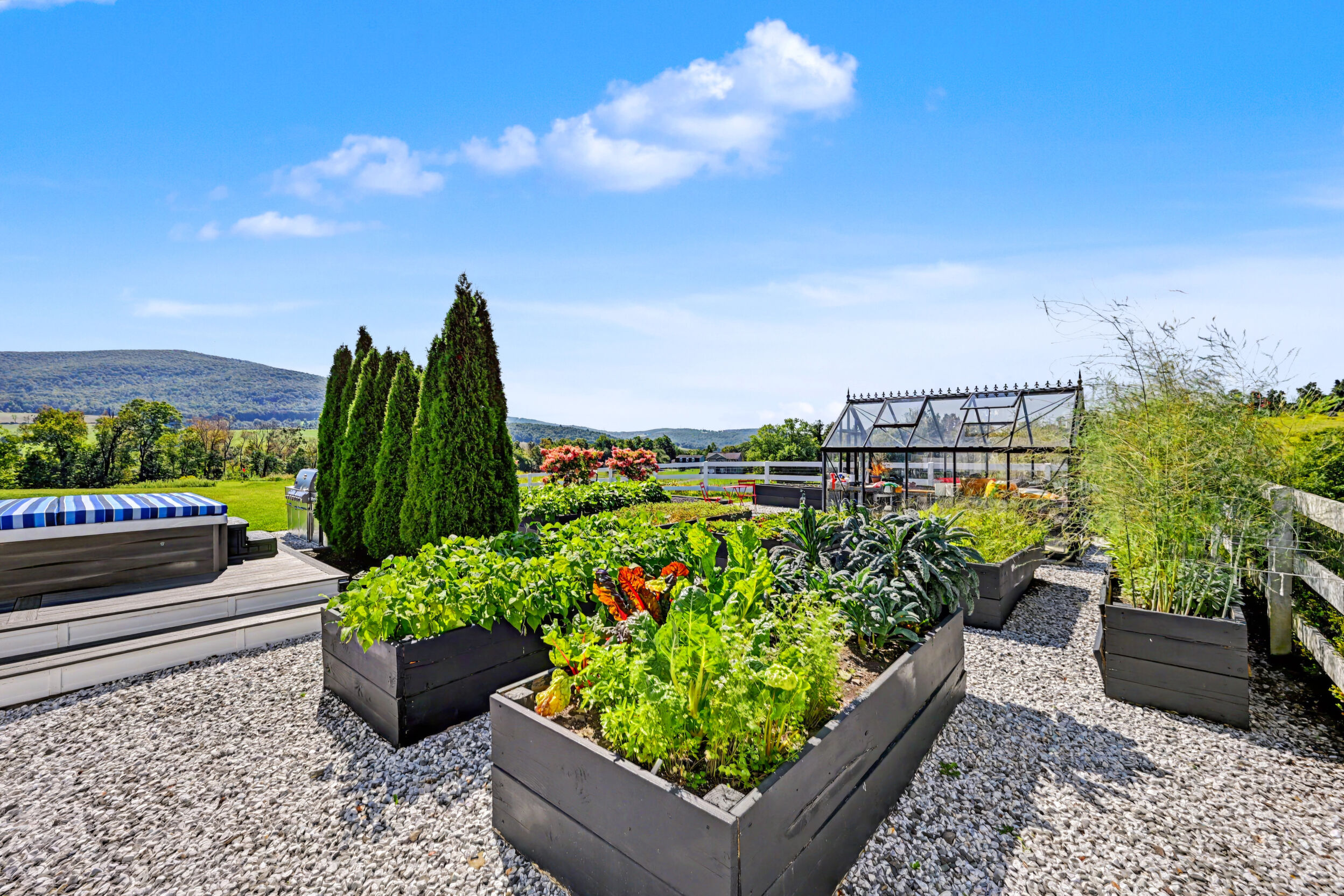 Raised garden beds and greenhouse
