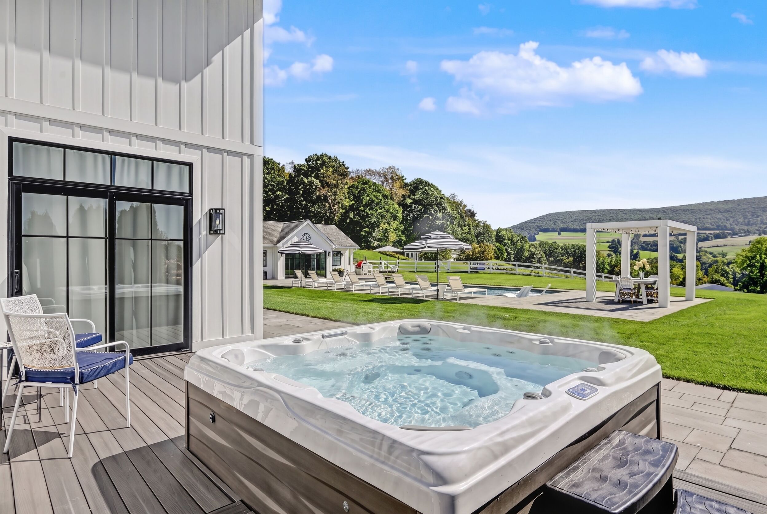 Hot tub deck overlooking the pool lawn