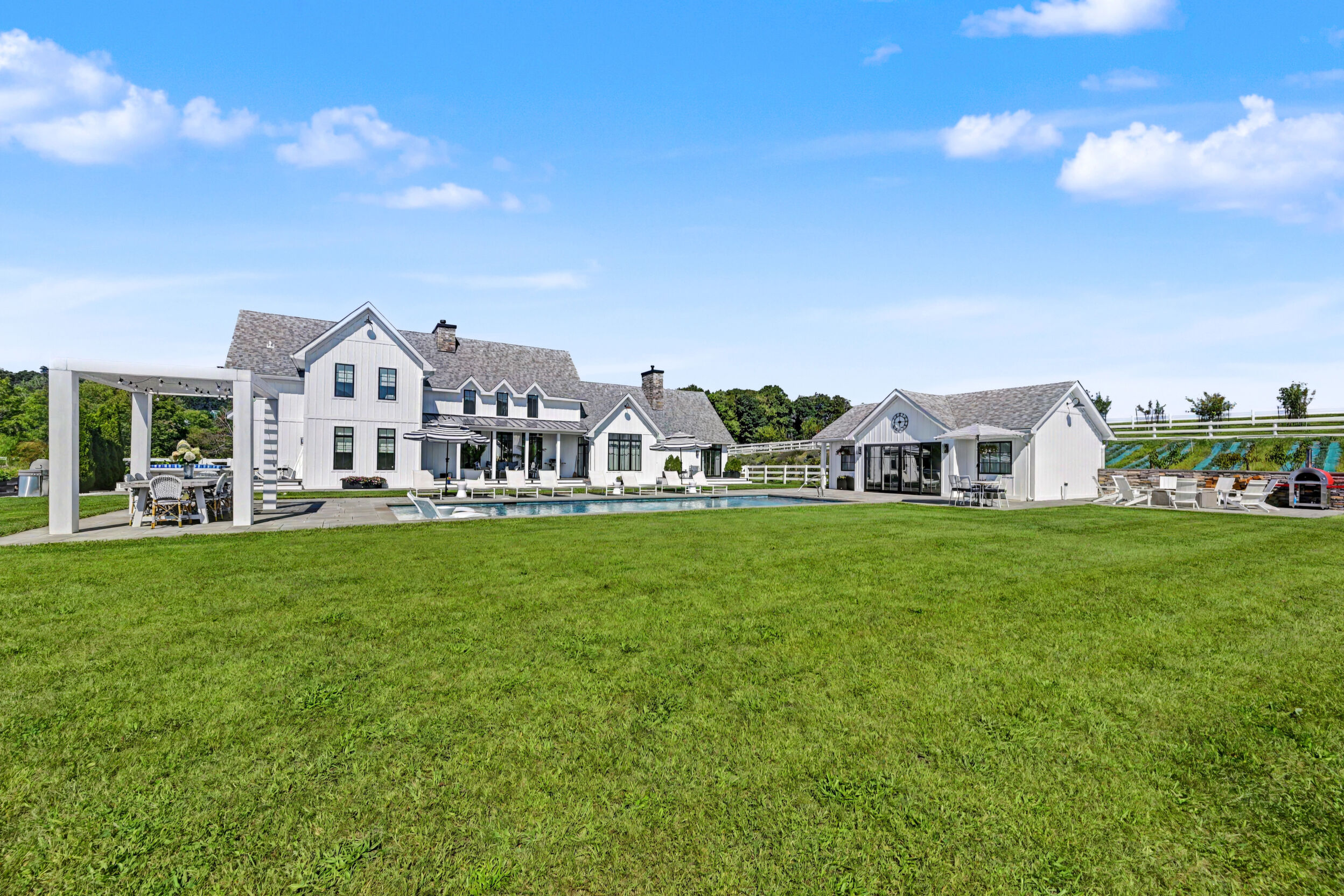 Residence and outbuildings across the pasture