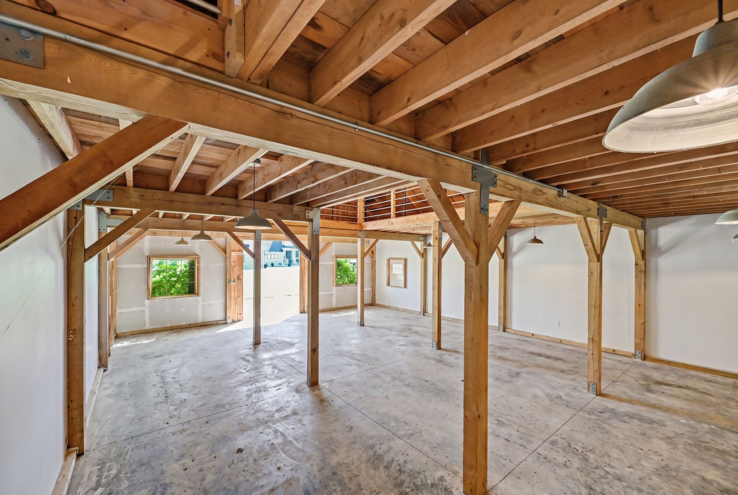 Barn interior with hanging barn lighting