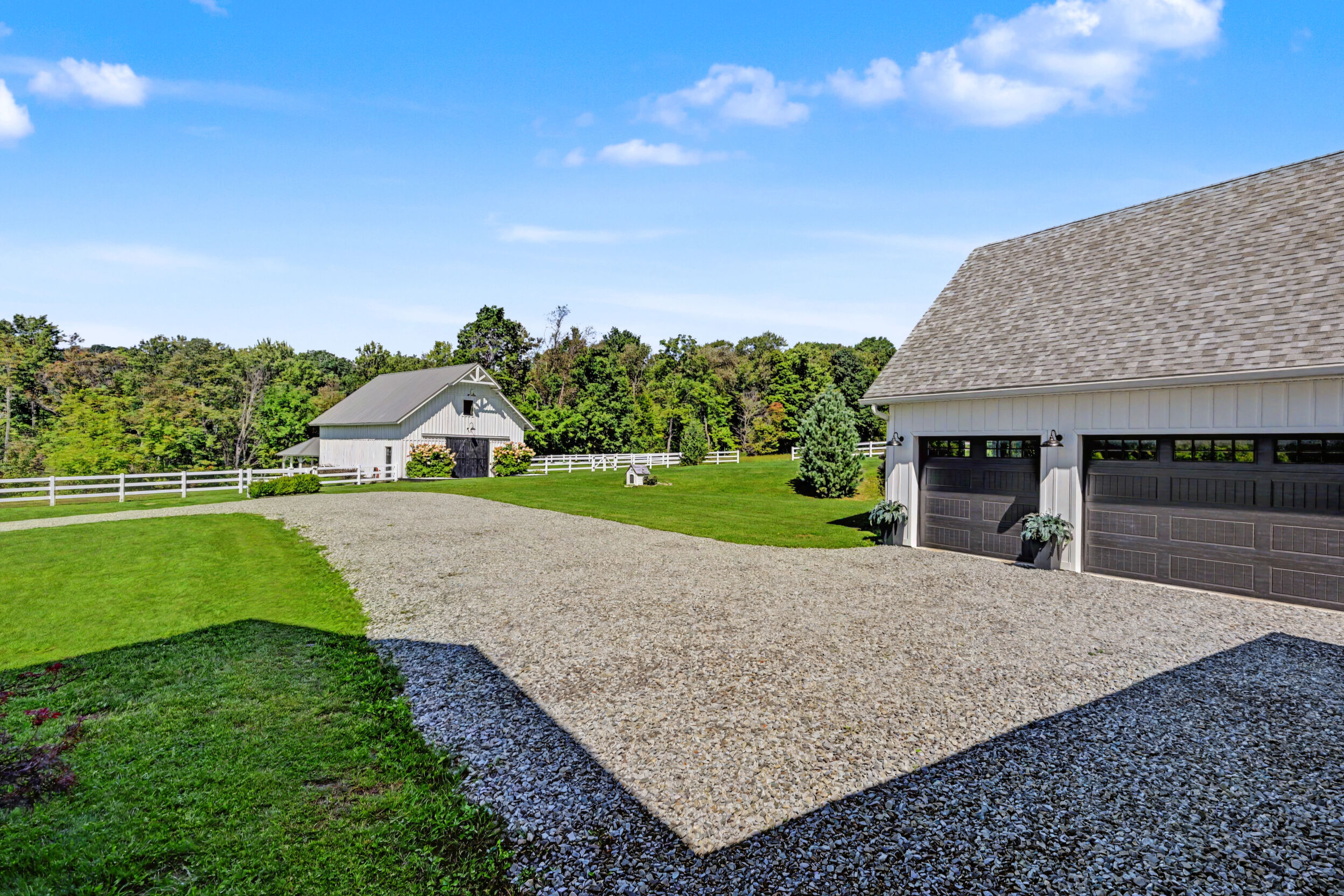 Three-car garage and motor court