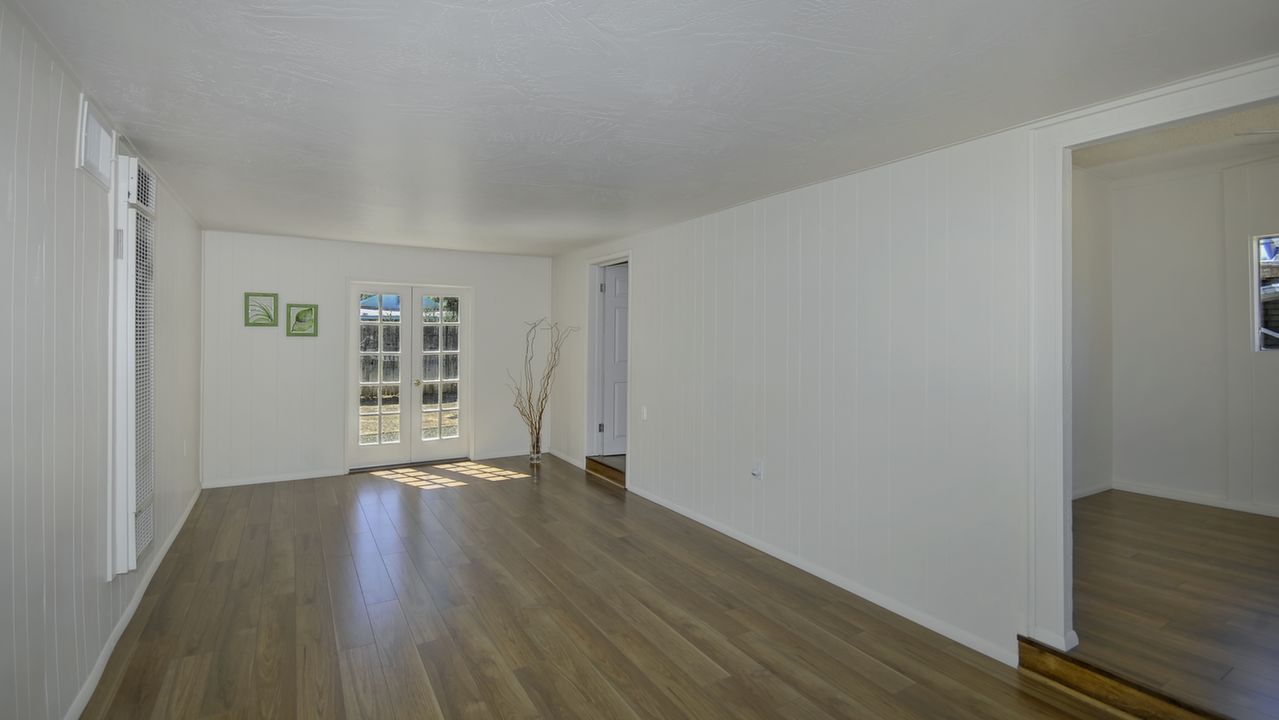 Bright living room w french doors