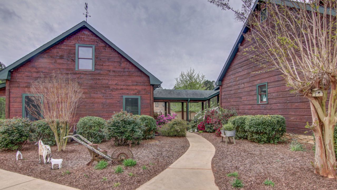 Breezeway leads to Three Car Garage